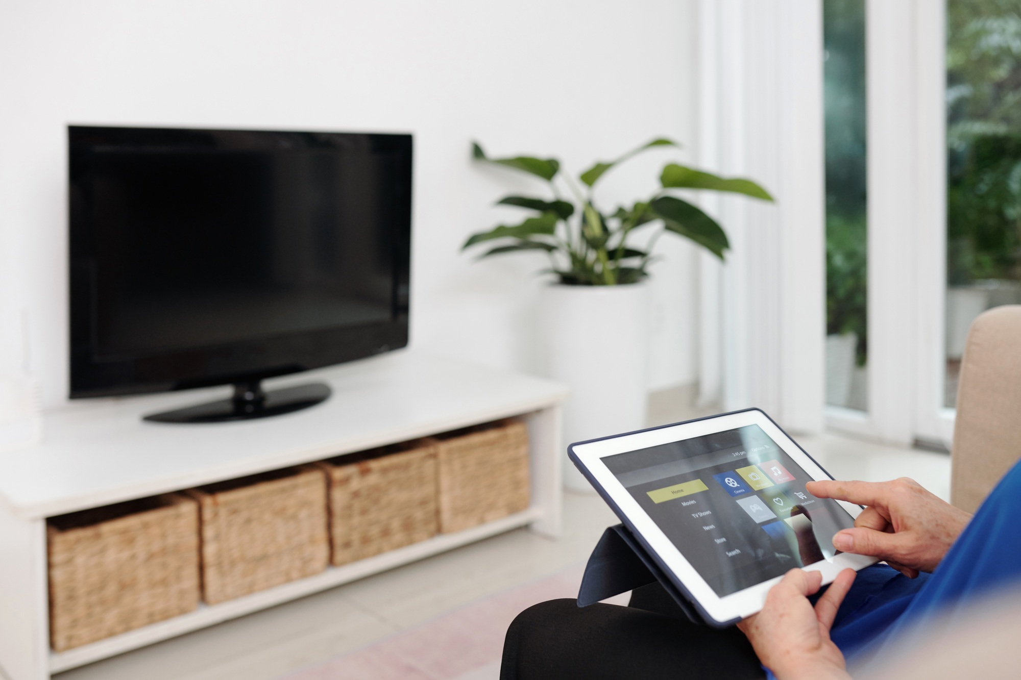 Elderly Woman Using Smart Home App